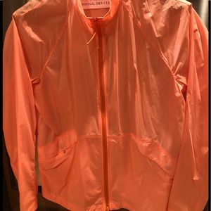 Windbreaker with deep pockets and double zipper.